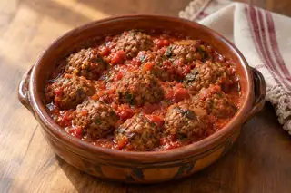Kofta bel Roz (Rice Meatballs in Tomato Sauce)